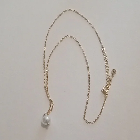 #1110. 5 Piece Assorted Gold Toned Pendant And Faux Pearl Necklace Bundle - Picture 2 of 10